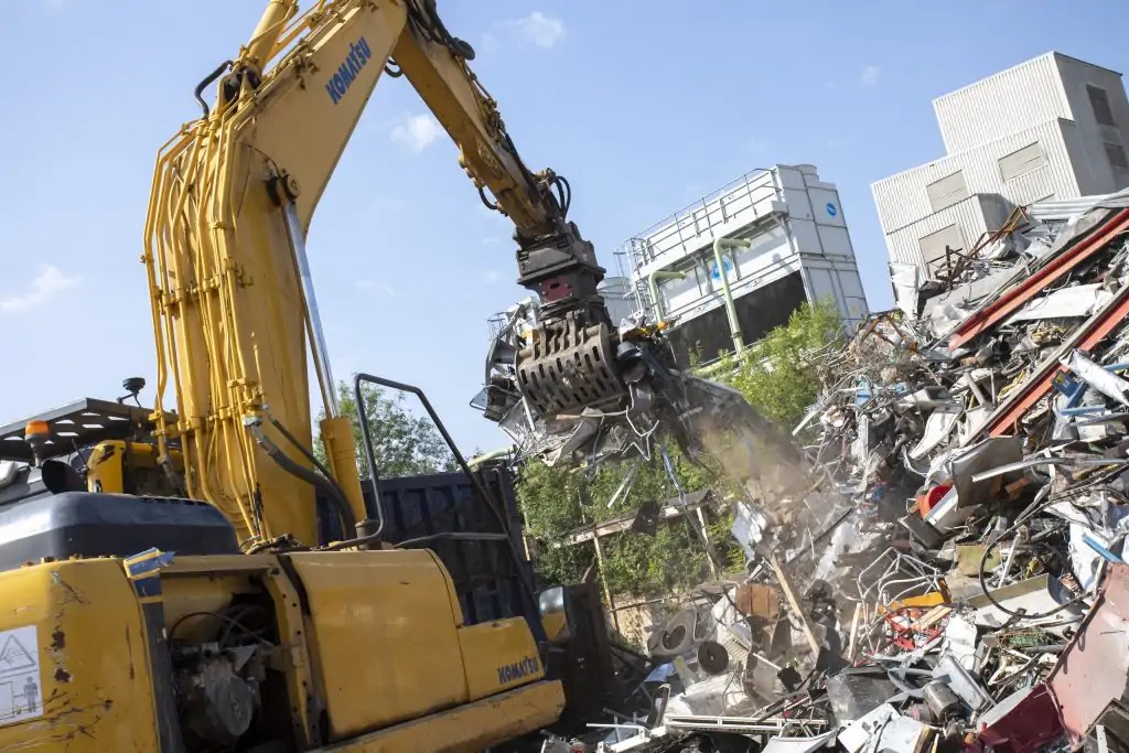 scrap metal being sorted in a pile