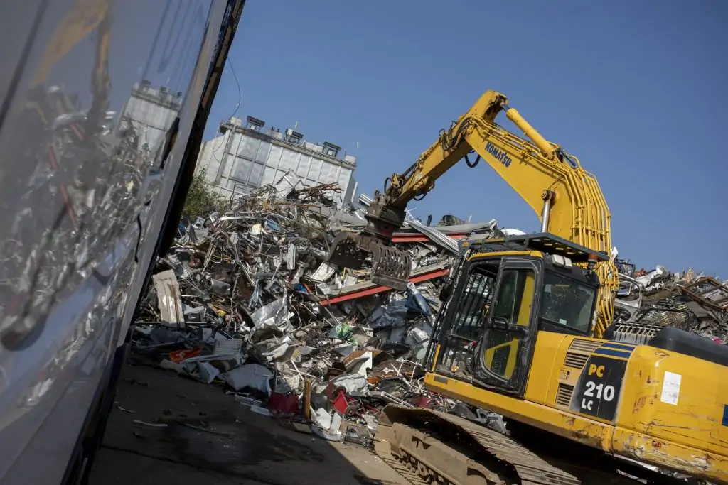 a scrap metal pile being sorted